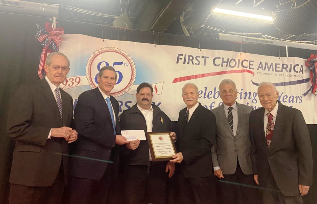 First Choice America board of directors award Weirton Fire Department with Community Spirit Award.